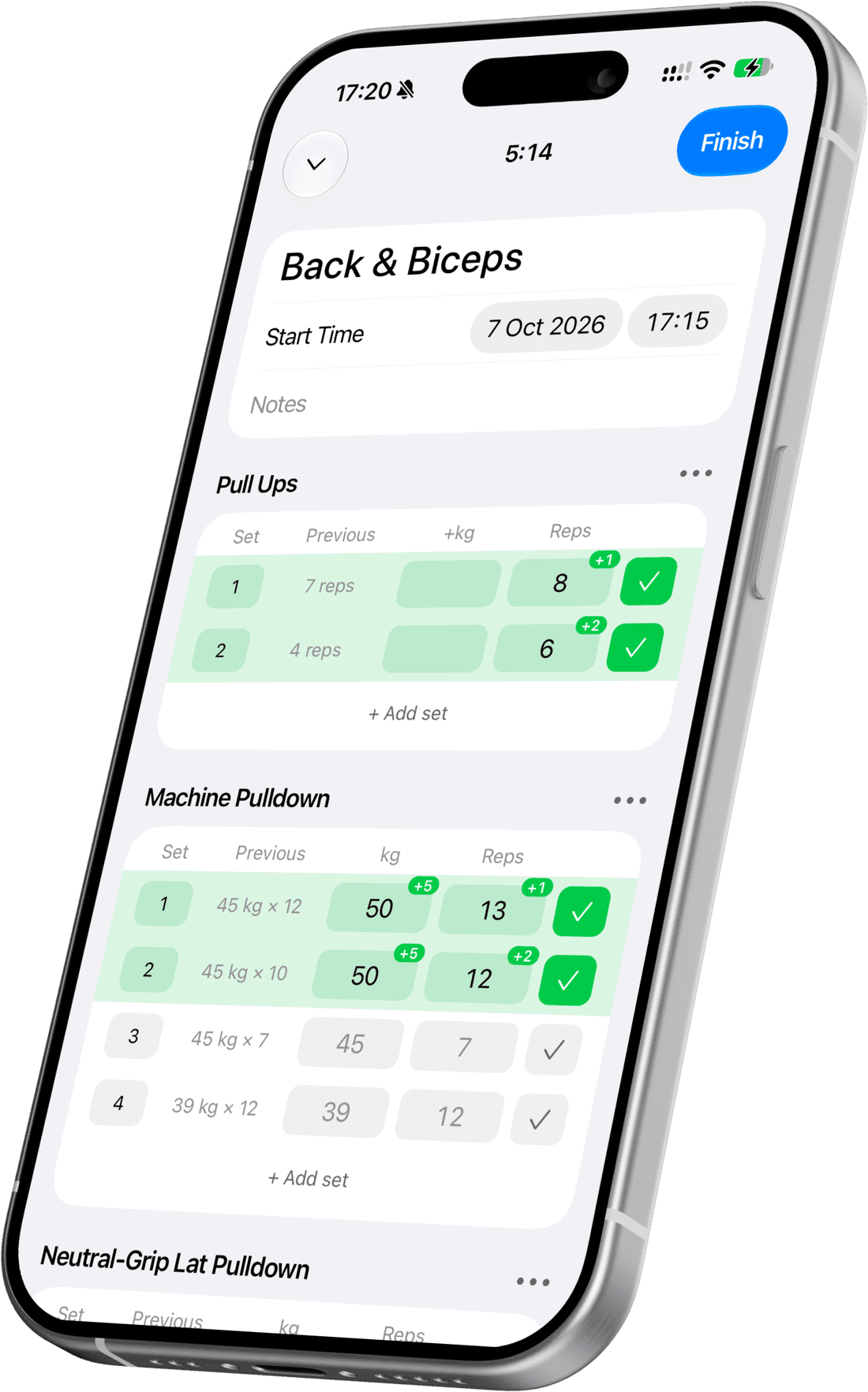 Logging pull ups and machine pulldowns in a Back & Biceps workout, with improved sets marked green